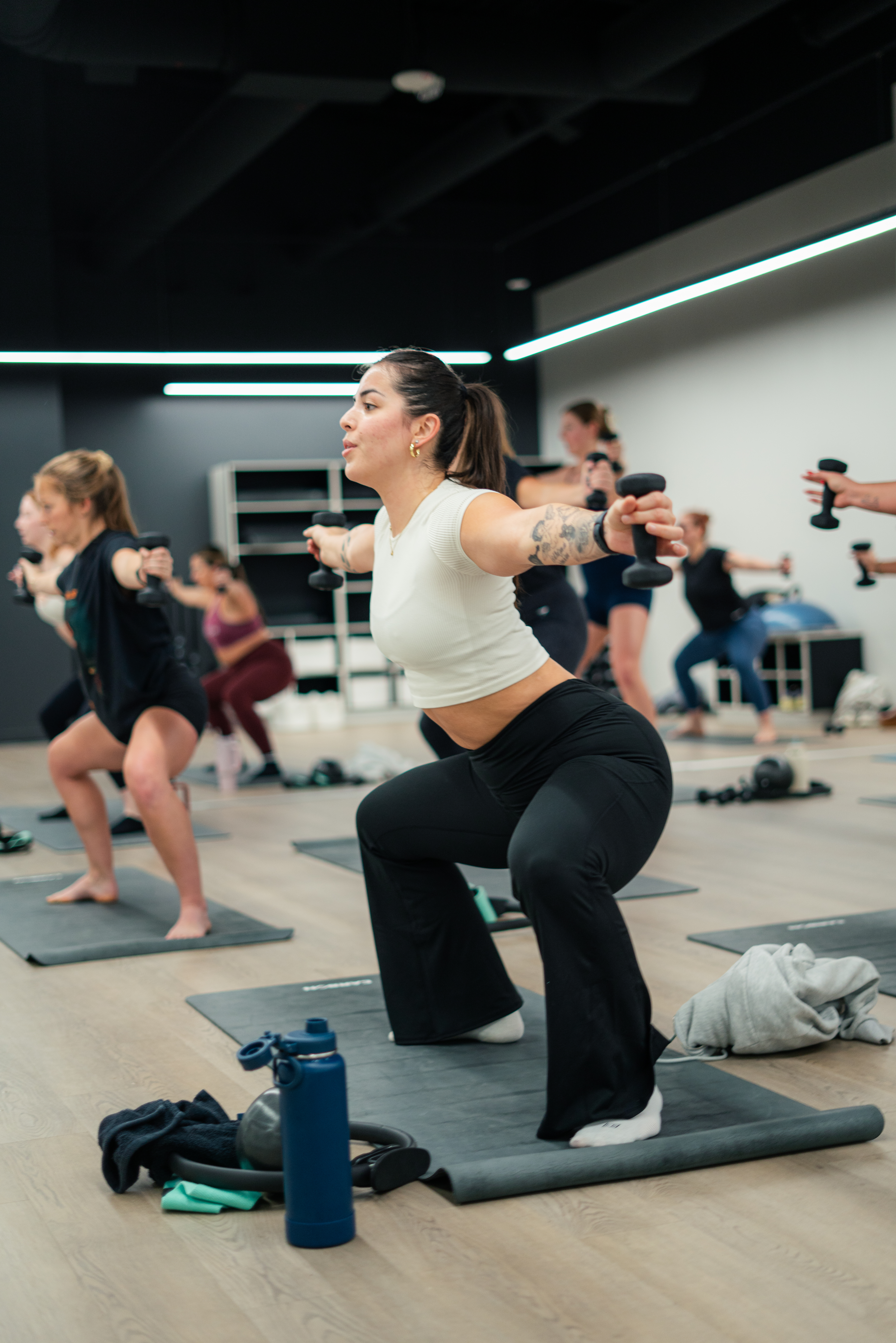 A woman in a weighted squat