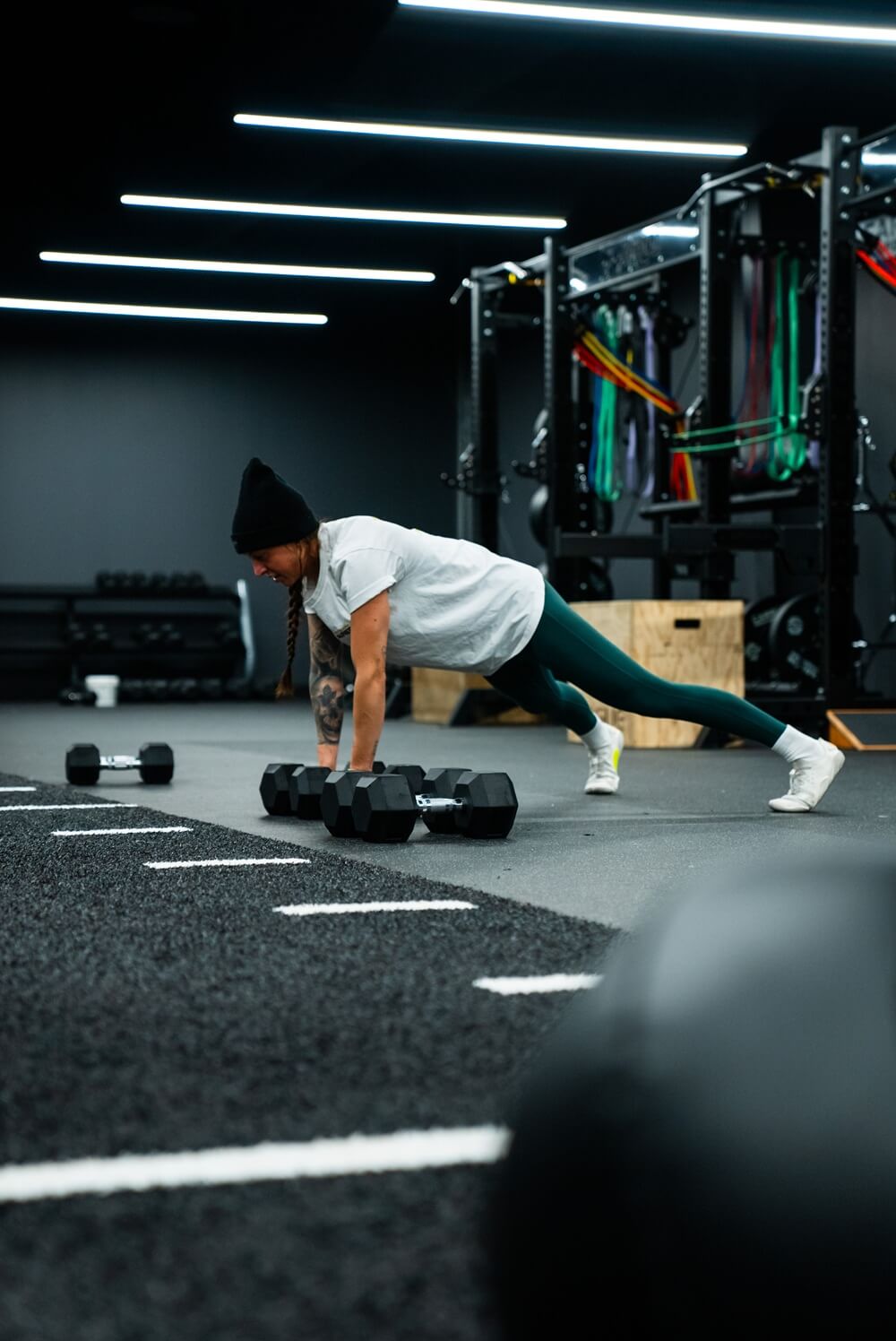 Edge Class with Weights A personal trainer demonstrating an exercise at Carbon Performance