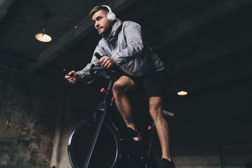 Man on bike A man on an indoor cycling machine.