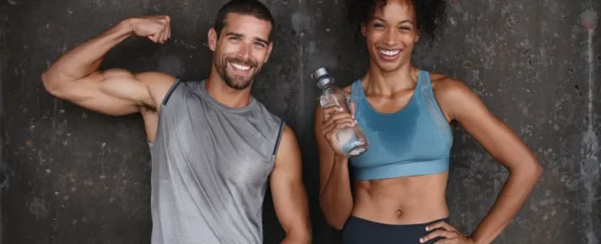 man and woman sweating and showing off muscles after a workout at carbon performance gym in nashville tn and franklin tn