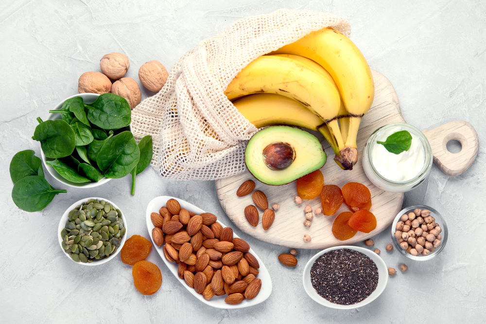 assortment of fruits nuts and legumes for balanced protein fat and carbs