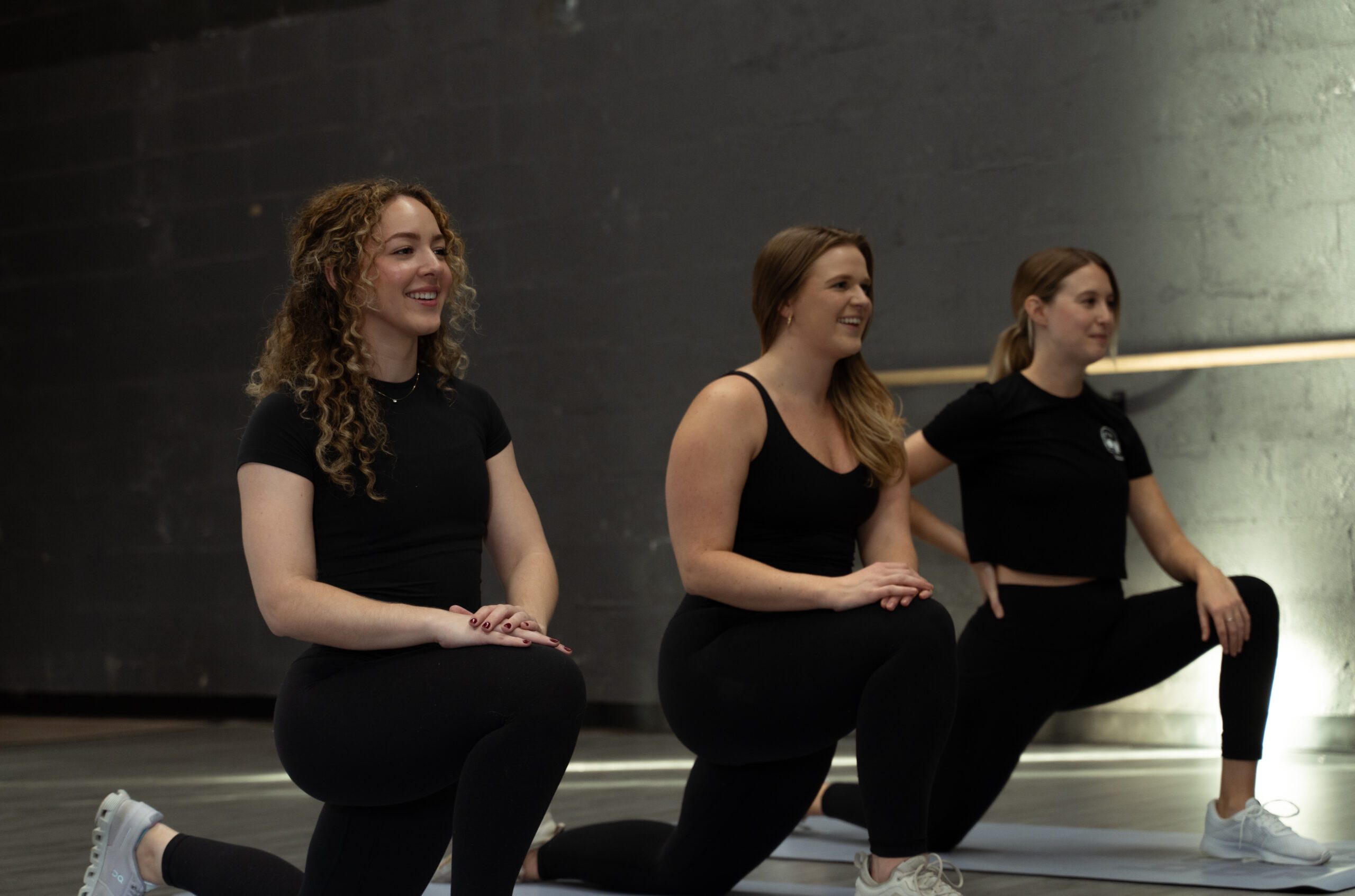 Three women working out at gym