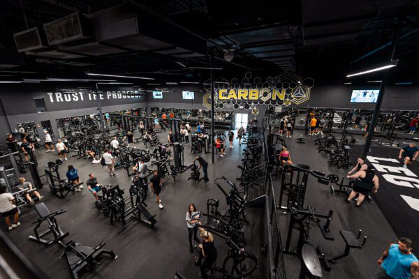 Many people working out at Carbon Performance gym