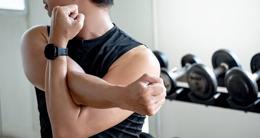 Man warms up before his workout for better results.