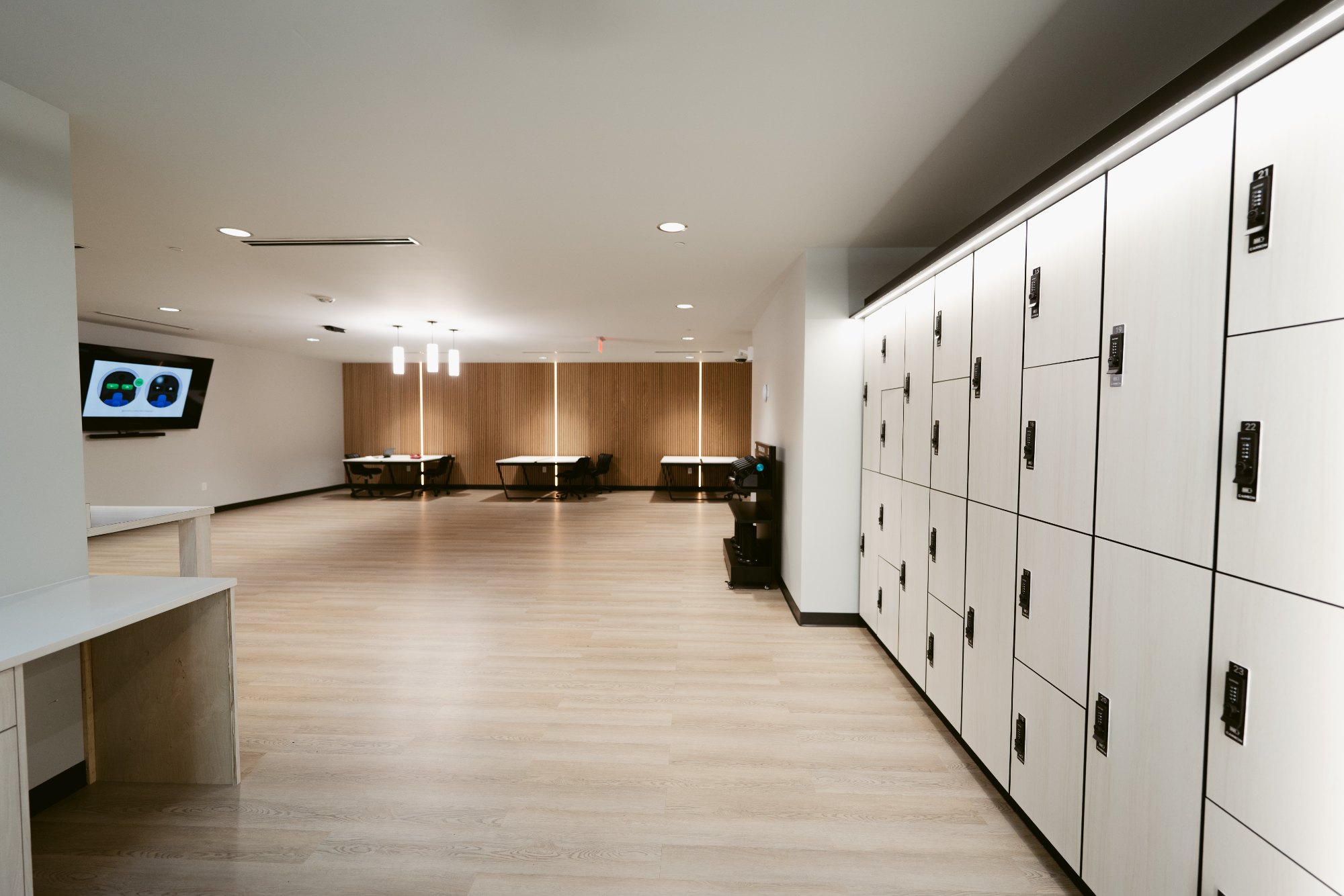 Elite Lounge with coworking desks and member lockers
