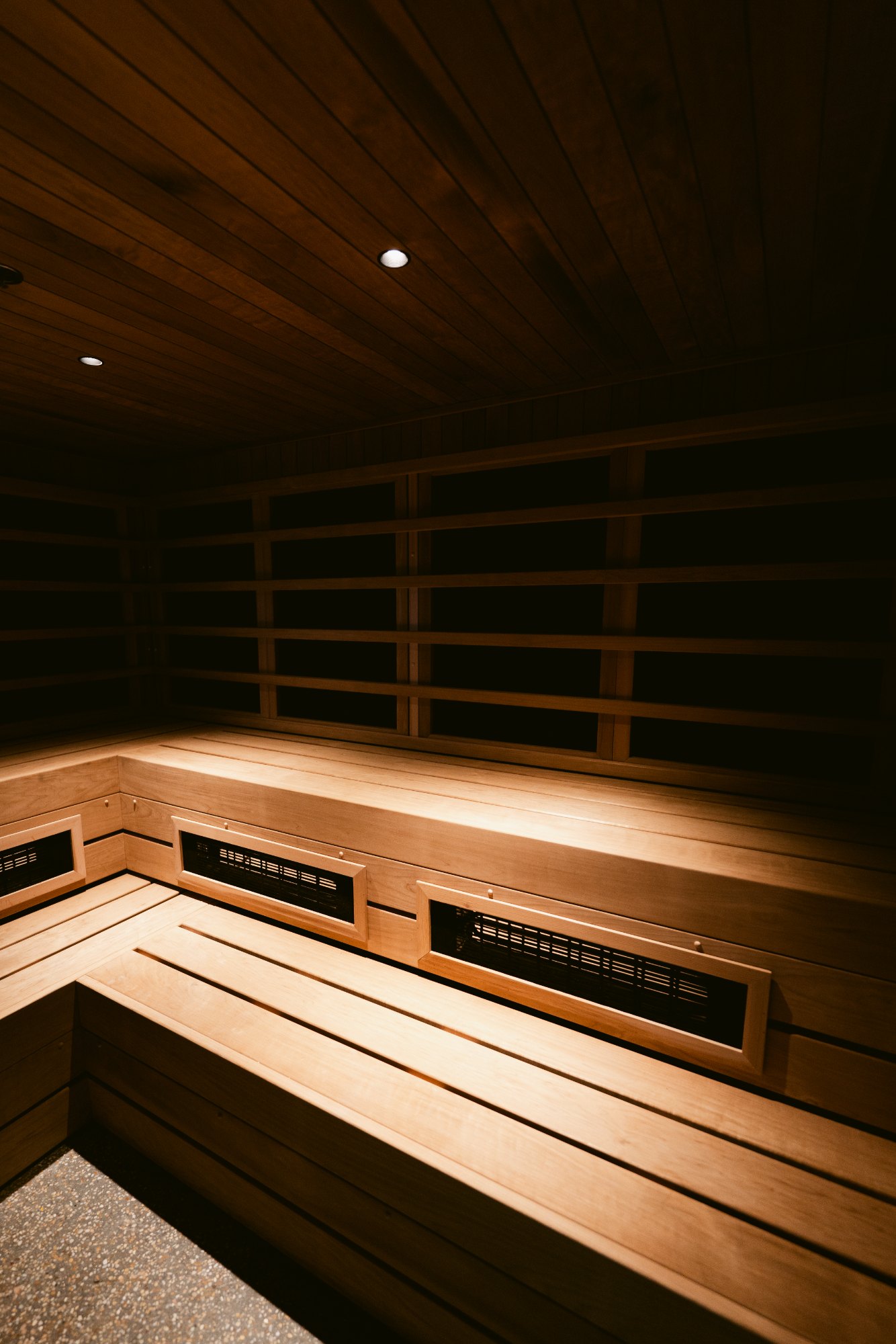 Warm wood interior of an infrared sauna